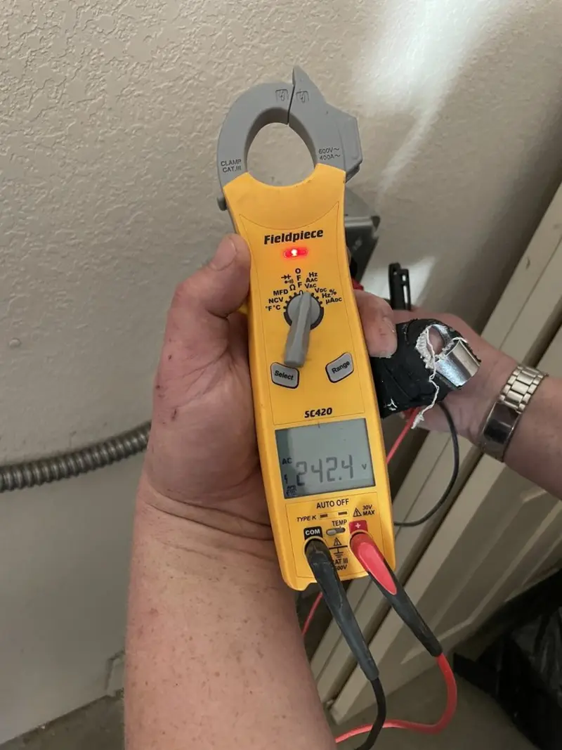 Voltage testing with clamp meter during Generator Installation in Gleneagle